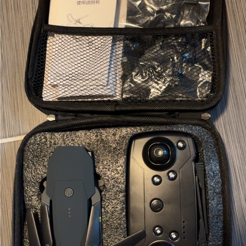 Controller in Carrying Case. Super Endurance Foldable Drone with accessories.